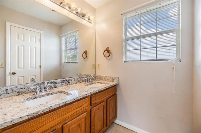 a bed room with a bed and a couch