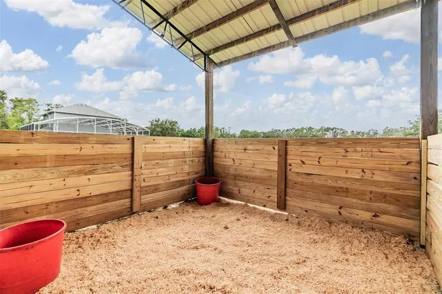 a view of a city with tall buildings and a big yard
