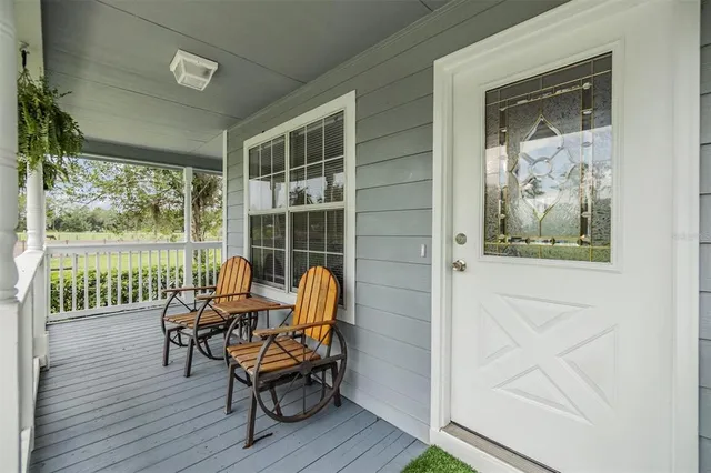 a kitchen with stainless steel appliances granite countertop a sink a stove and cabinets