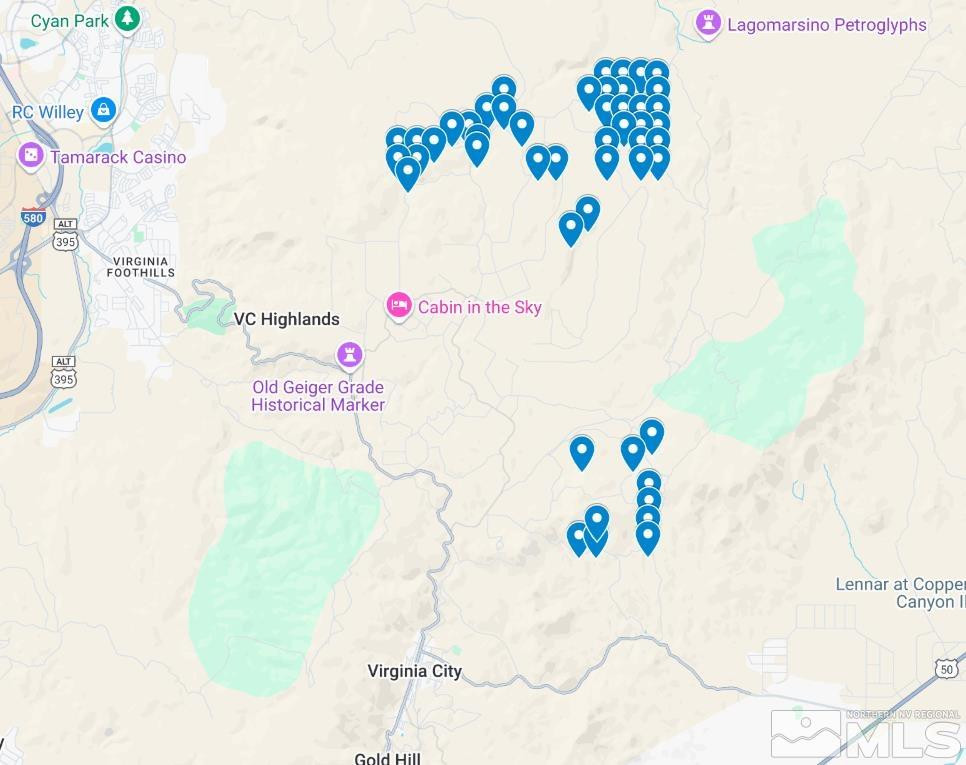 a white bench sitting next to a white wall