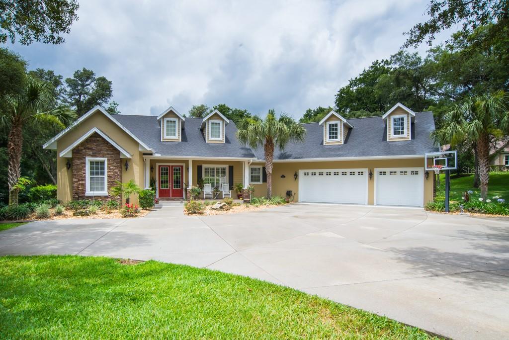 Beautiful 5 bedroom pool home with oversized 3 car garage.