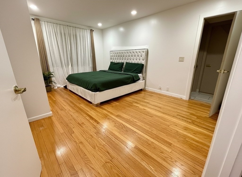 15 Pine Acre Road Springfield, MA 01129 - Photo 11 of 28 a bedroom with a bed and a mirror