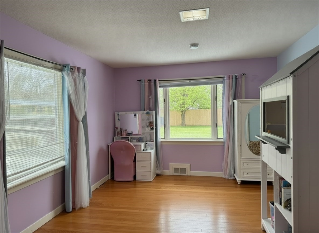 15 Pine Acre Road Springfield, MA 01129 - Photo 19 of 28 a view of an empty room with a window and a kitchen