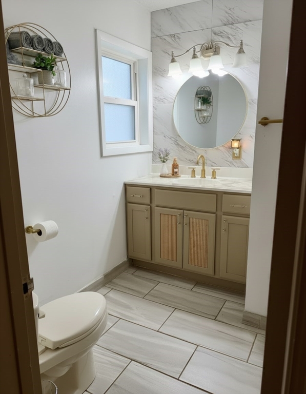 15 Pine Acre Road Springfield, MA 01129 - Photo 21 of 28 a bathroom with a toilet a sink and mirror