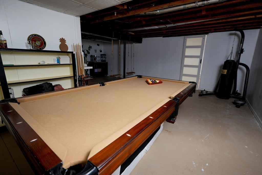15 Pine Acre Road Springfield, MA 01129 - Photo 25 of 28 a bed sitting in a bedroom next to a window