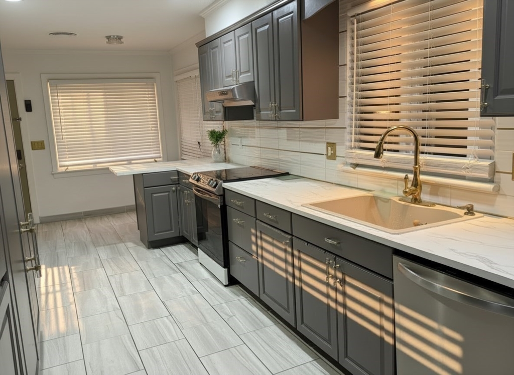 15 Pine Acre Road Springfield, MA 01129 - Photo 5 of 28 a kitchen with stainless steel appliances granite countertop a sink and a granite counter tops