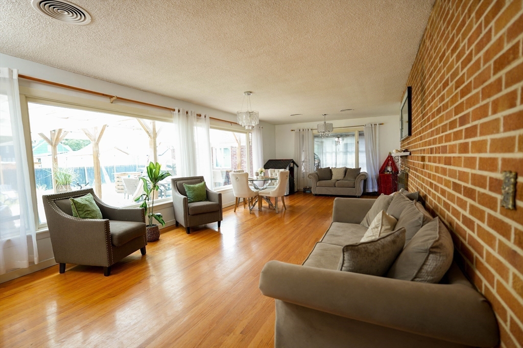 15 Pine Acre Road Springfield, MA 01129 - Photo 8 of 28 a living room with furniture and a large window