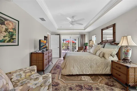 a bed room with a bed and dresser