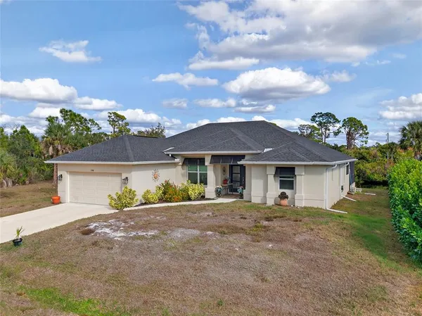 front view of a house with a yard
