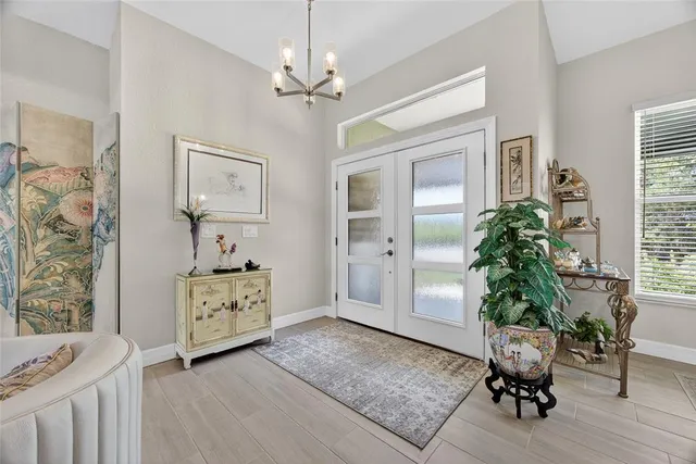 a room with furniture and wooden floor