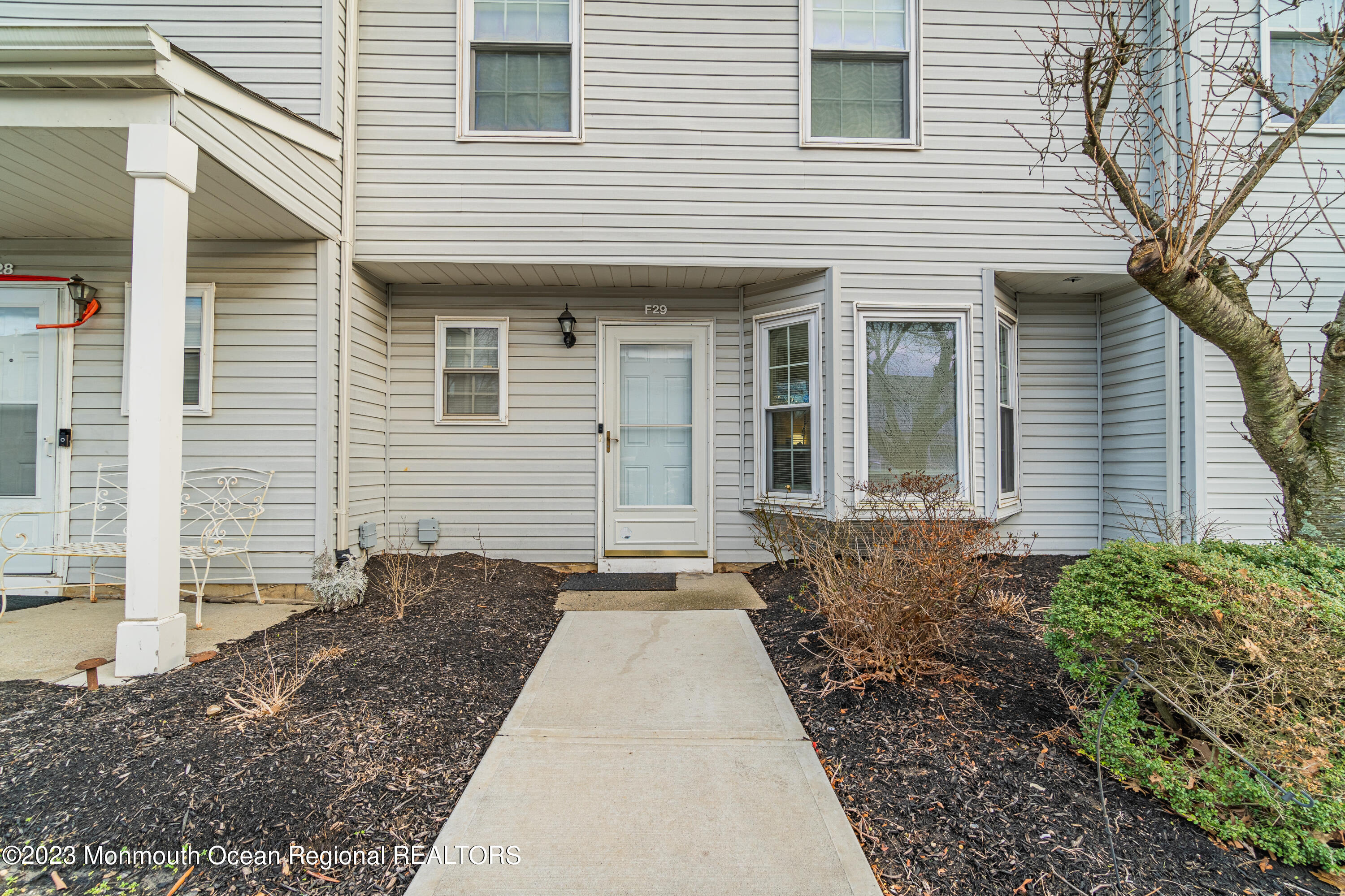 60 County Road, Unit F29 Cliffwood, NJ 07721 - Photo 1 of 26 a view of a house with a backyard