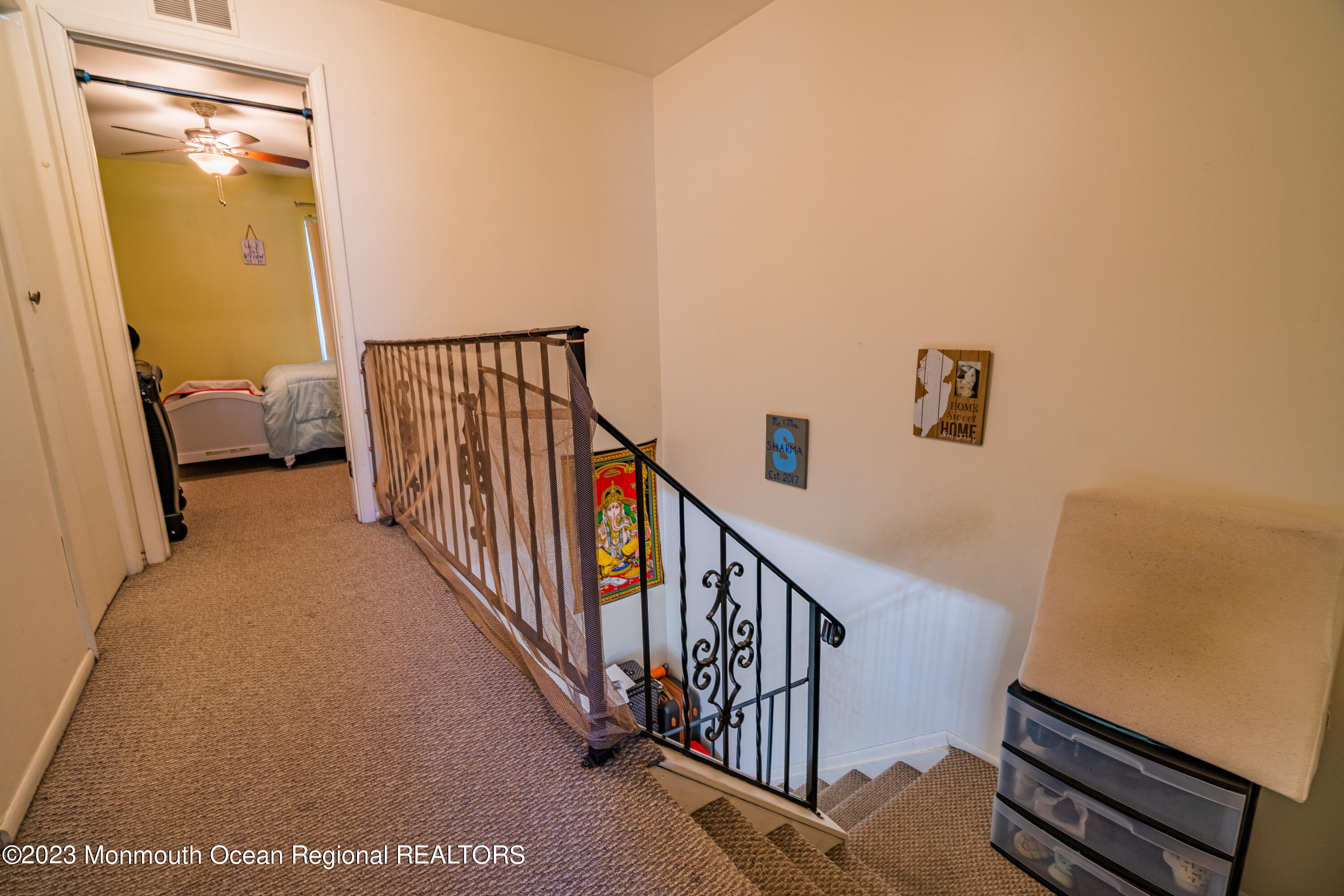 60 County Road, Unit F29 Cliffwood, NJ 07721 - Photo 12 of 26 a view of a hallway with a livingroom with furniture