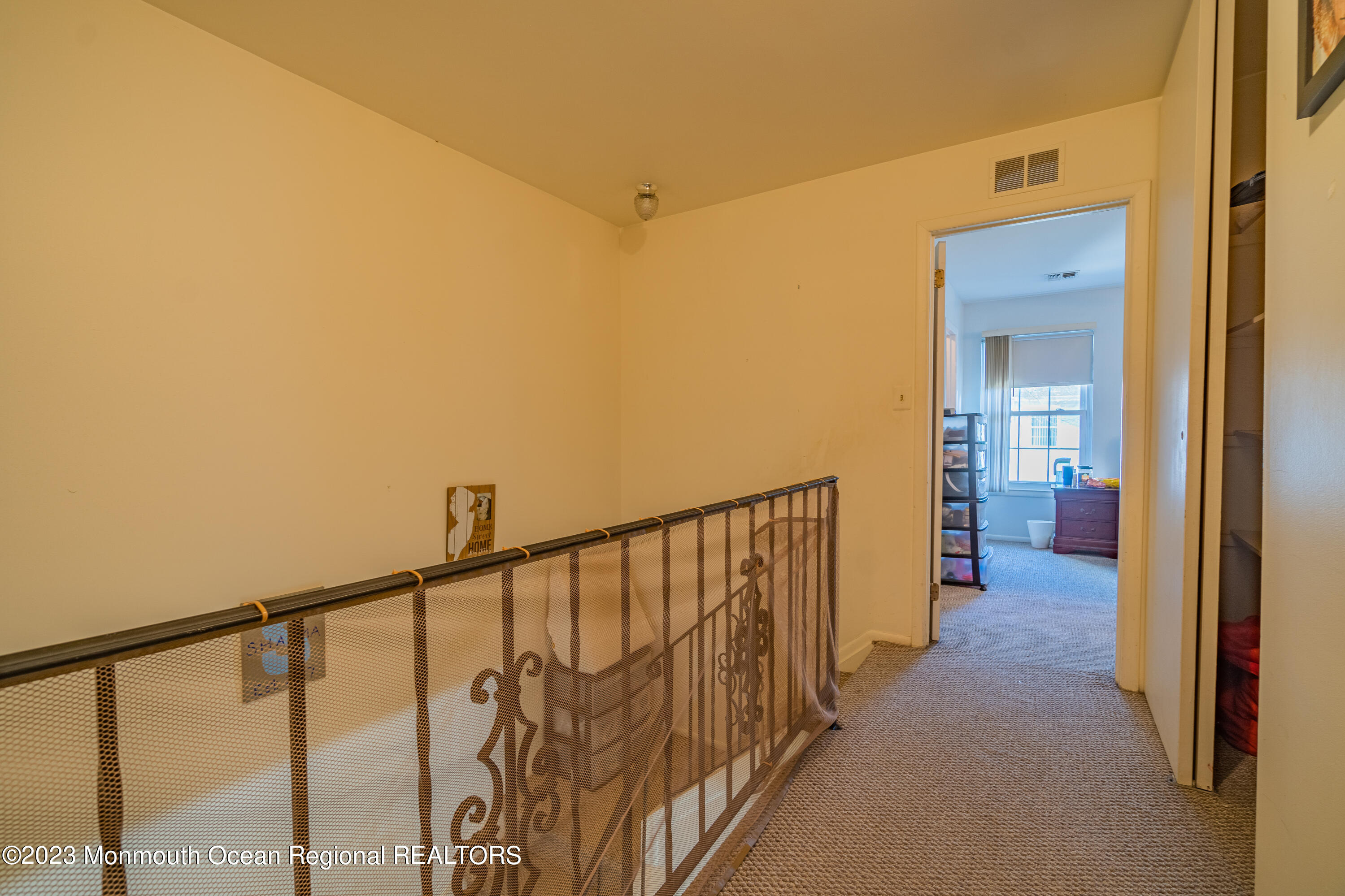 60 County Road, Unit F29 Cliffwood, NJ 07721 - Photo 14 of 26 a view of a hallway with wooden floor and a bathroom