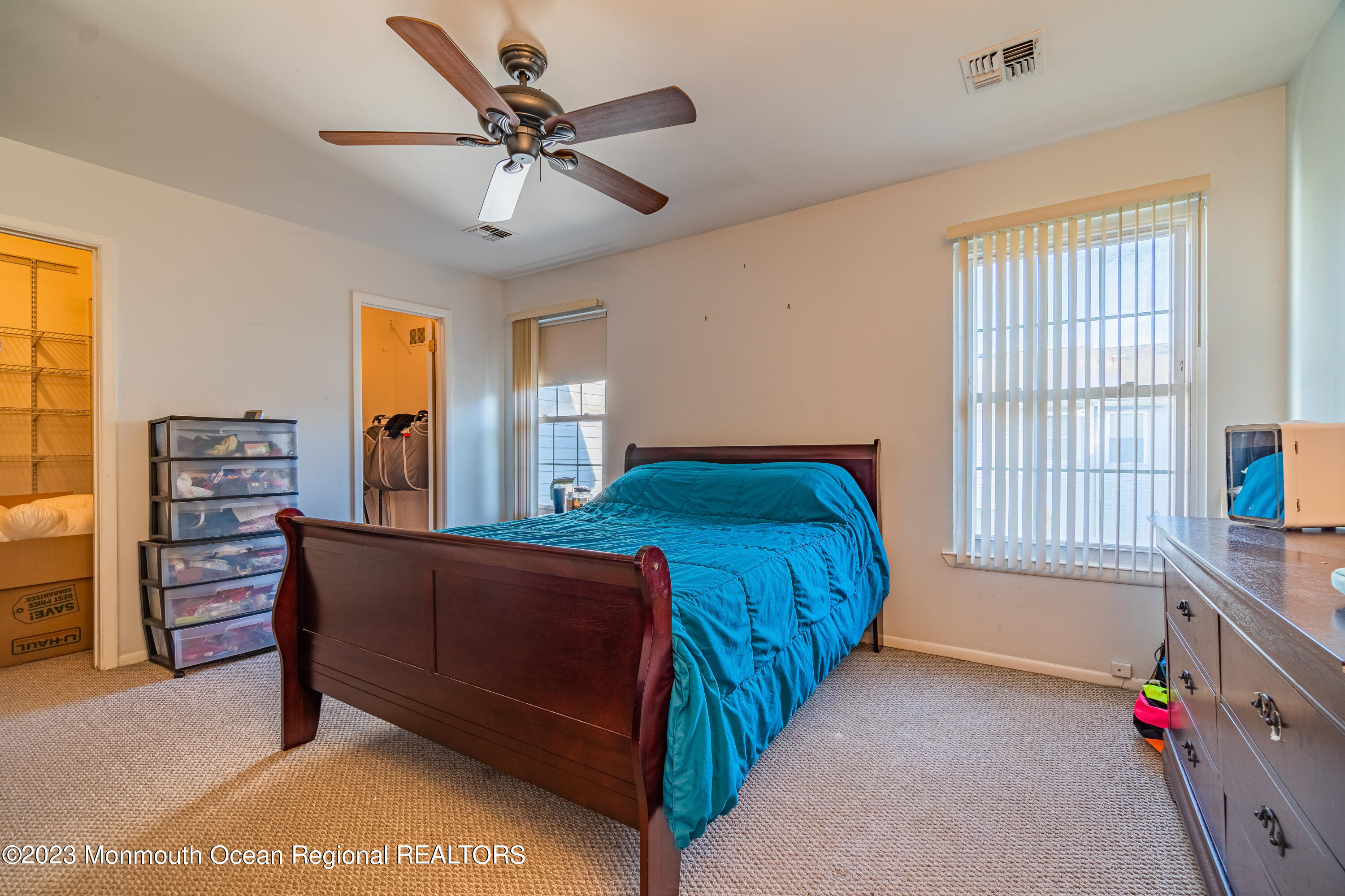 60 County Road, Unit F29 Cliffwood, NJ 07721 - Photo 20 of 26 a bedroom with a bed and a window