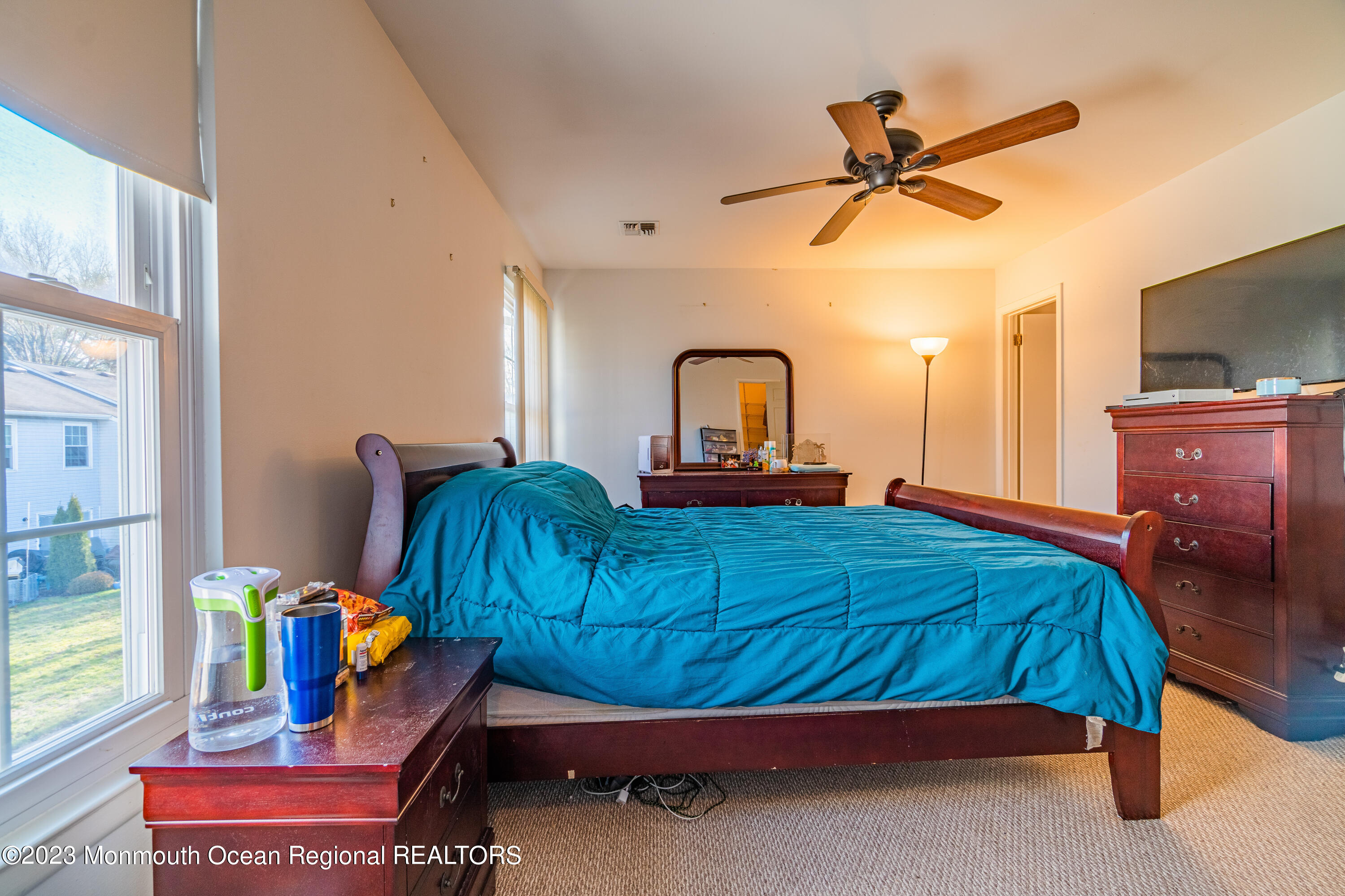 60 County Road, Unit F29 Cliffwood, NJ 07721 - Photo 21 of 26 a bedroom with a bed and dresser