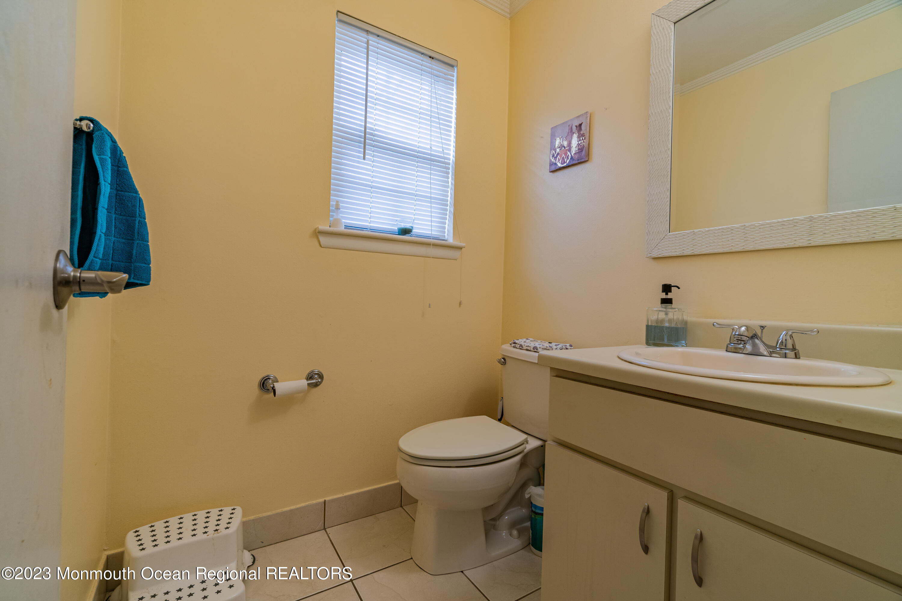 60 County Road, Unit F29 Cliffwood, NJ 07721 - Photo 7 of 26 a bathroom with a toilet sink and mirror