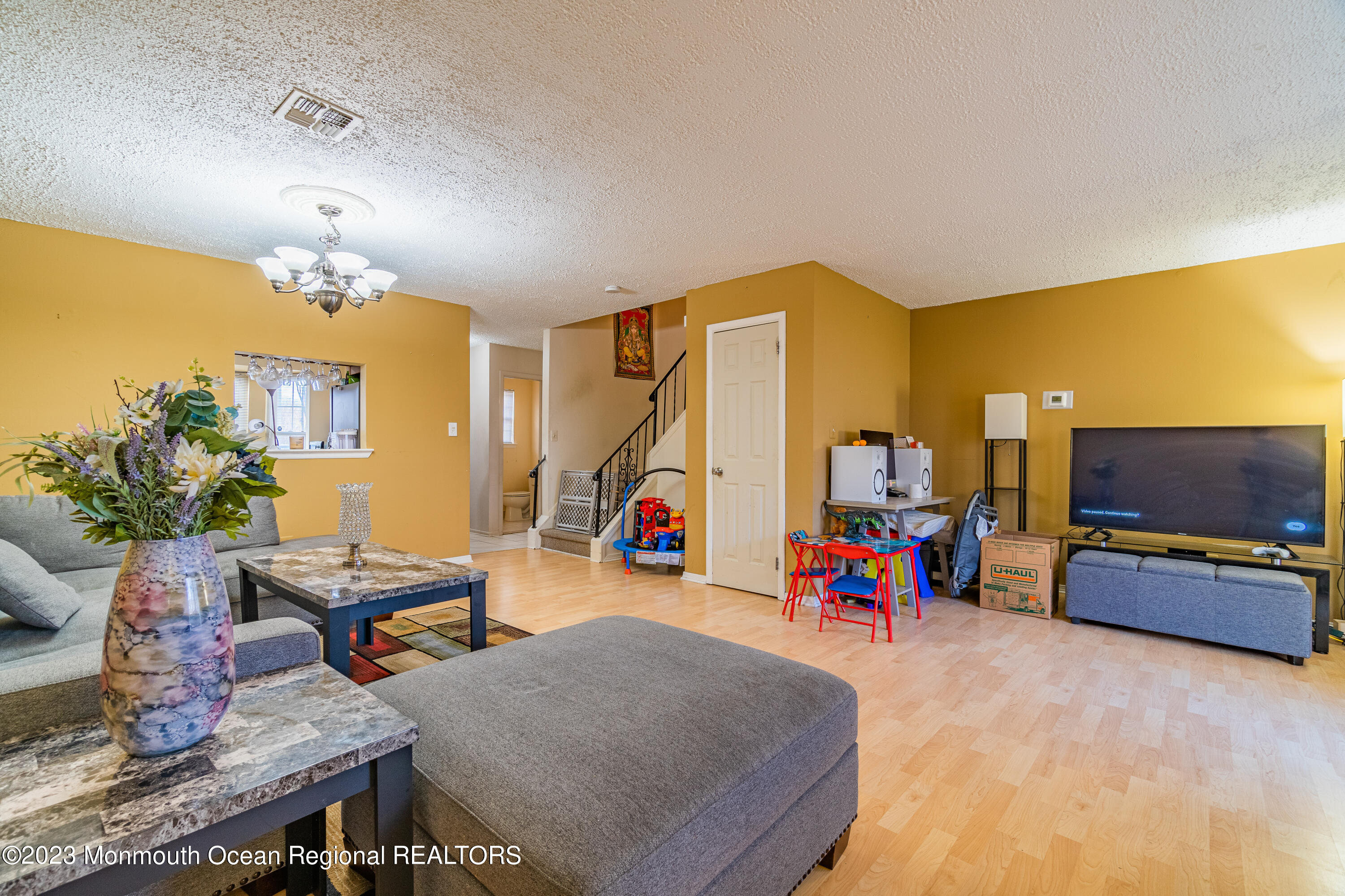 60 County Road, Unit F29 Cliffwood, NJ 07721 - Photo 10 of 26 a living room with furniture and a flat screen tv