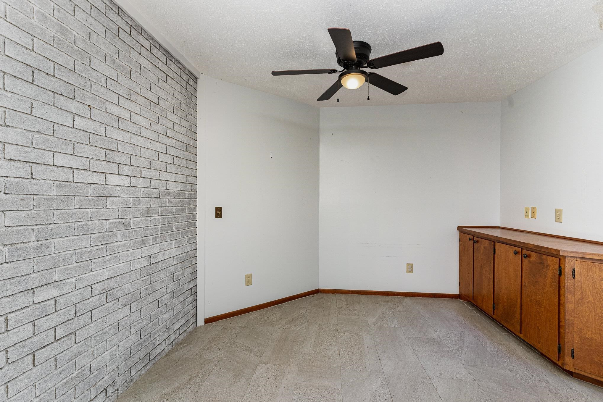 513 Argyll Drive Sanford, NC 27332 - Photo 11 of 31 a view of a livingroom with a ceiling fan and wooden floor