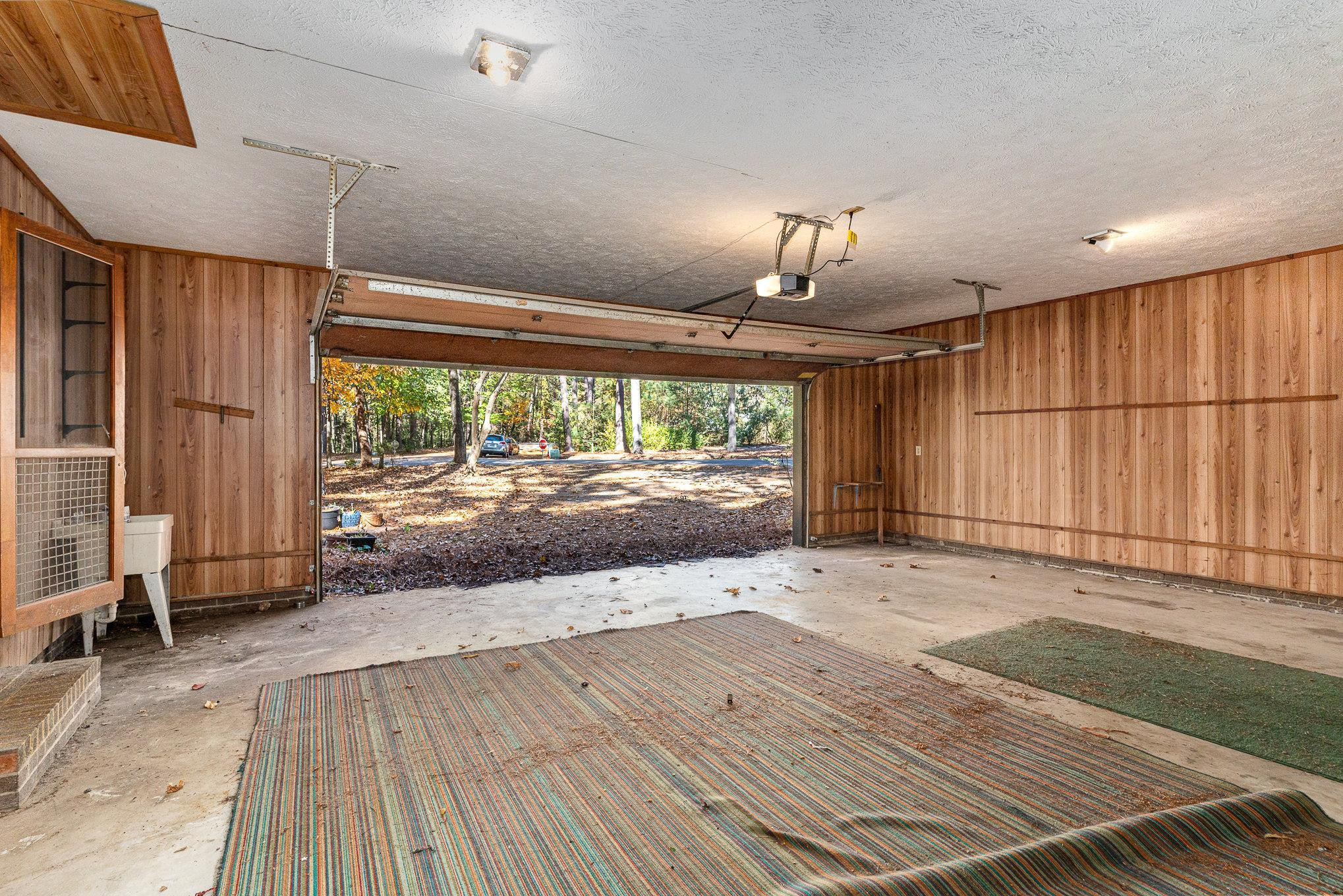 513 Argyll Drive Sanford, NC 27332 - Photo 13 of 31 a view of a room with wooden floor and iron stairs