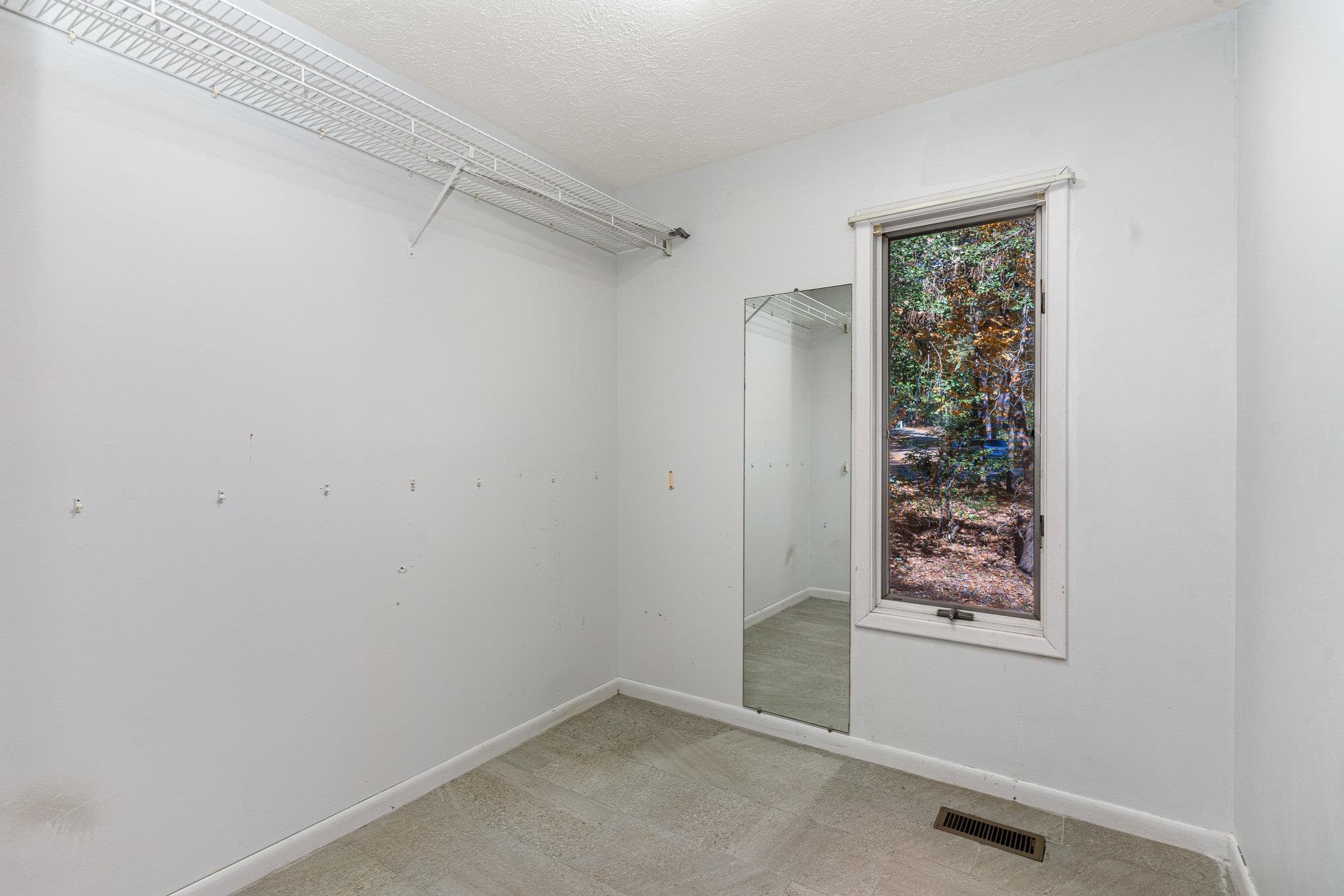 513 Argyll Drive Sanford, NC 27332 - Photo 18 of 31 an empty room with a window