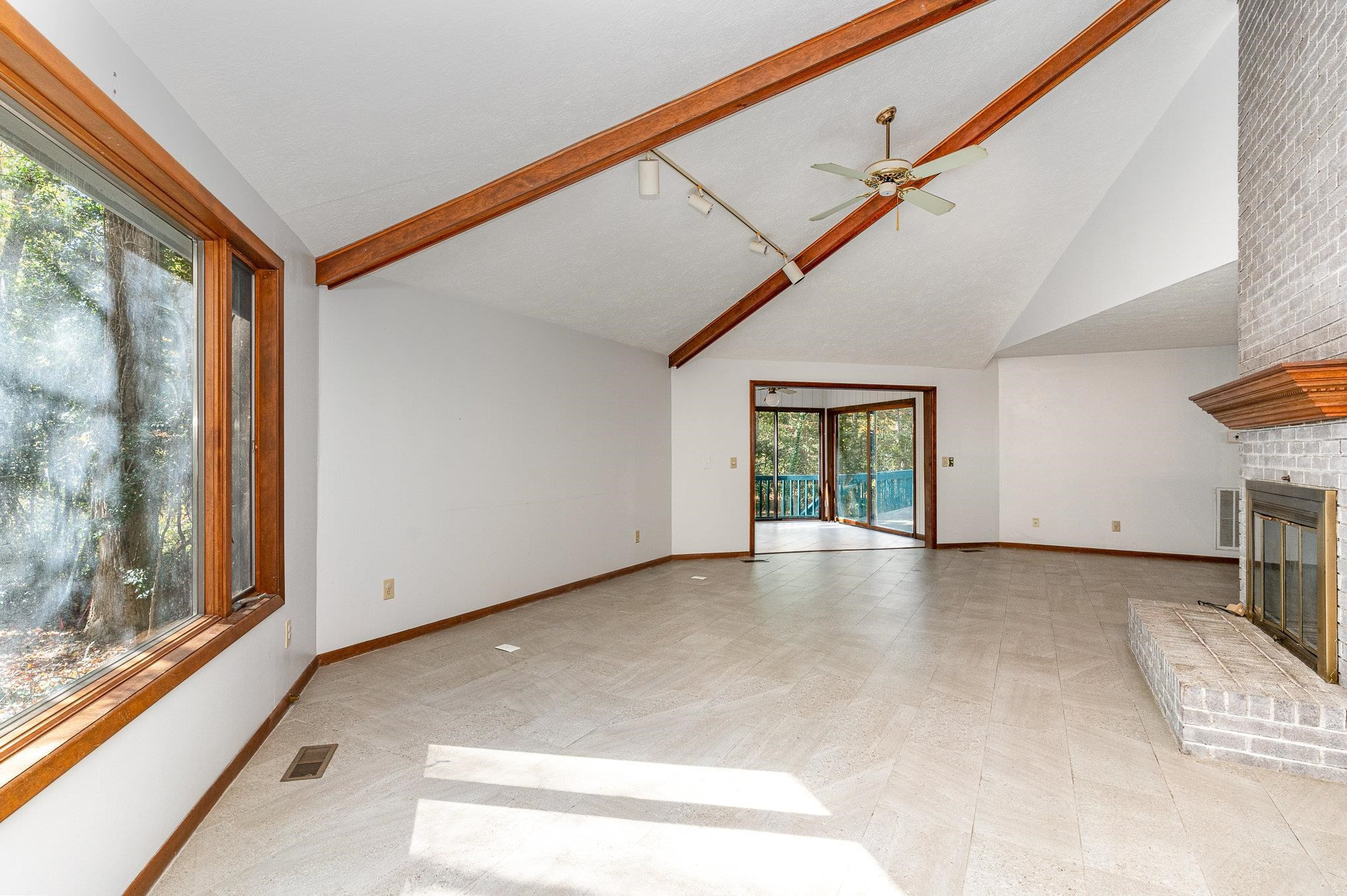 513 Argyll Drive Sanford, NC 27332 - Photo 5 of 31 a view of livingroom with furniture and floor to ceiling window