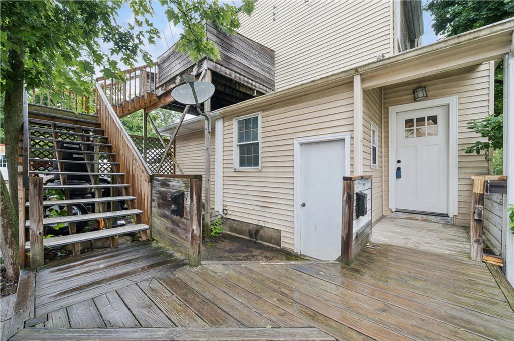 1523 Evergreen Road Pittsburgh, PA 15209 - Photo 31 of 35 a view of a house with backyard and wooden floor