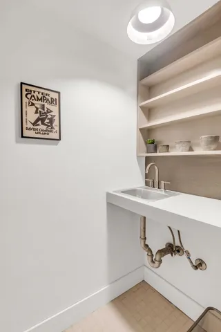 a view of a room with rack on the wall