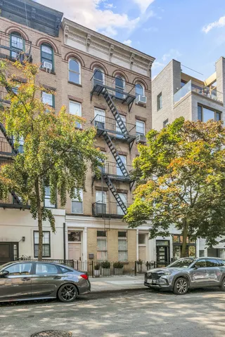 a car parked in front of a building