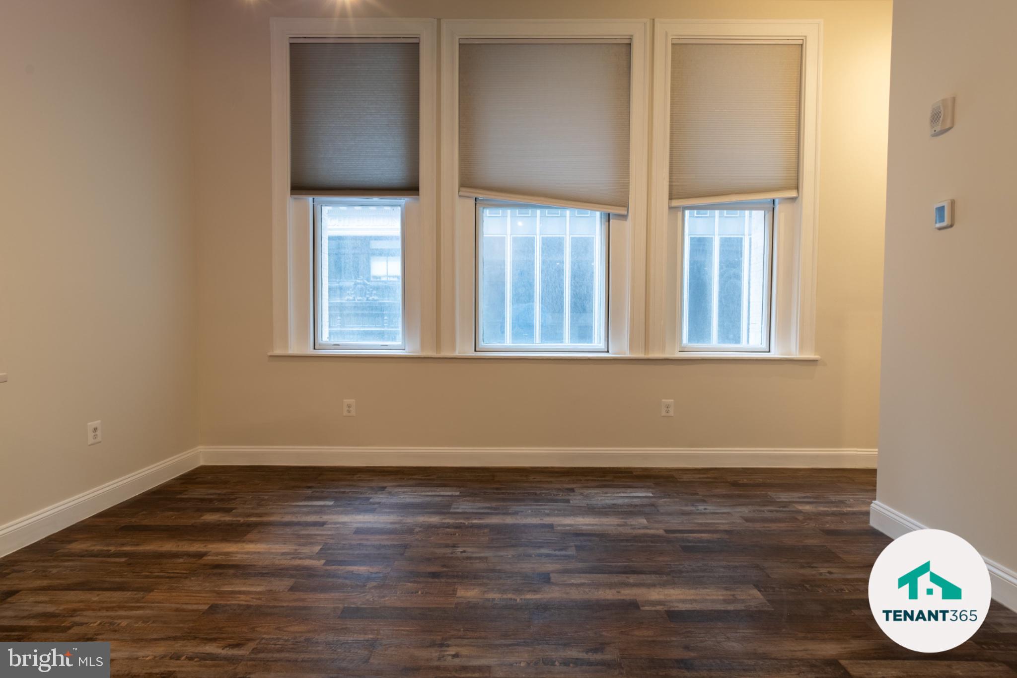 8 East Fayette Street, Unit 201 Baltimore, MD 21202 - Photo 13 of 14 Bright and airy space with natural light.