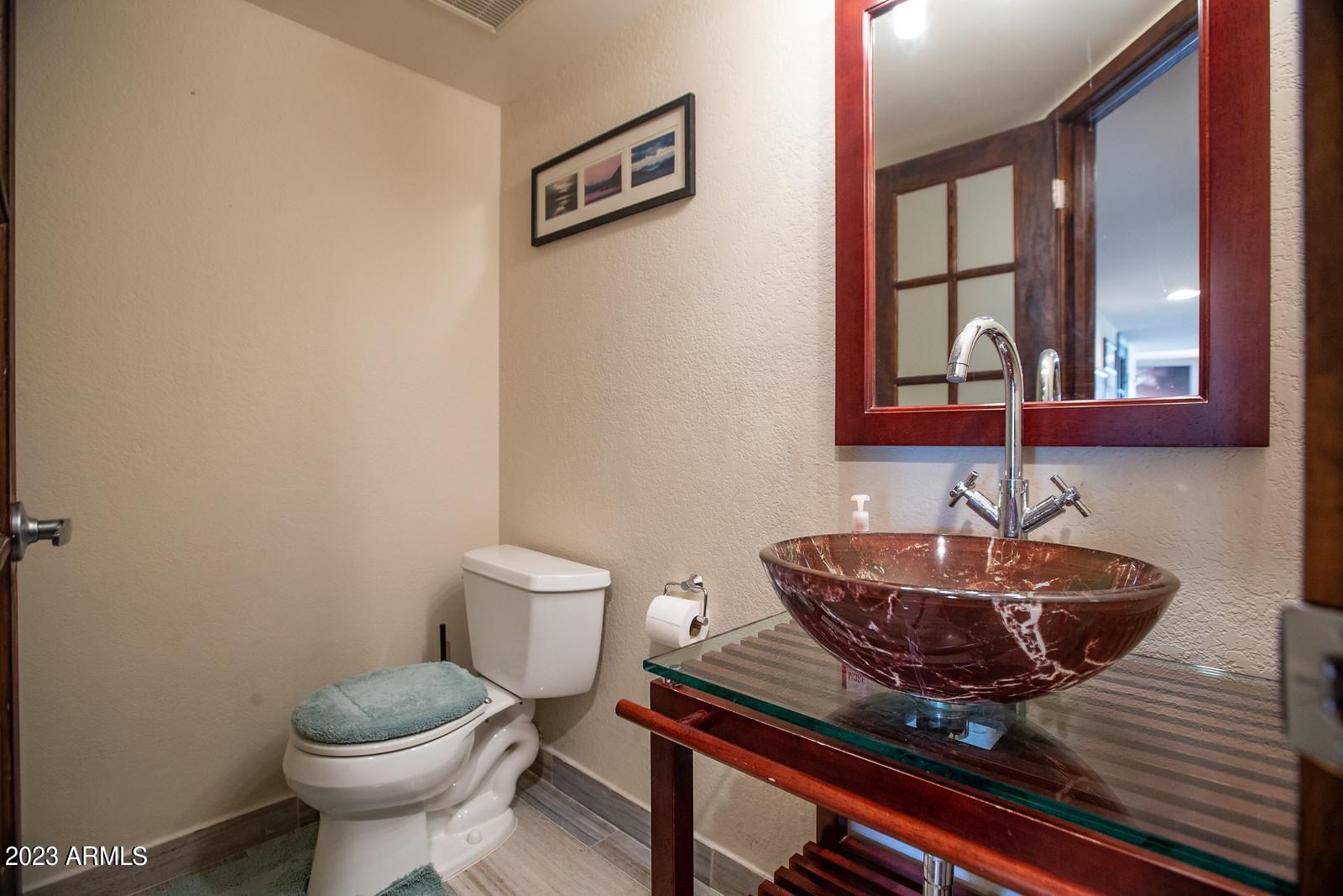 7755 East Thomas Road, Unit 10 Scottsdale, AZ 85251 - Photo 12 of 28 Half Bathroom 1