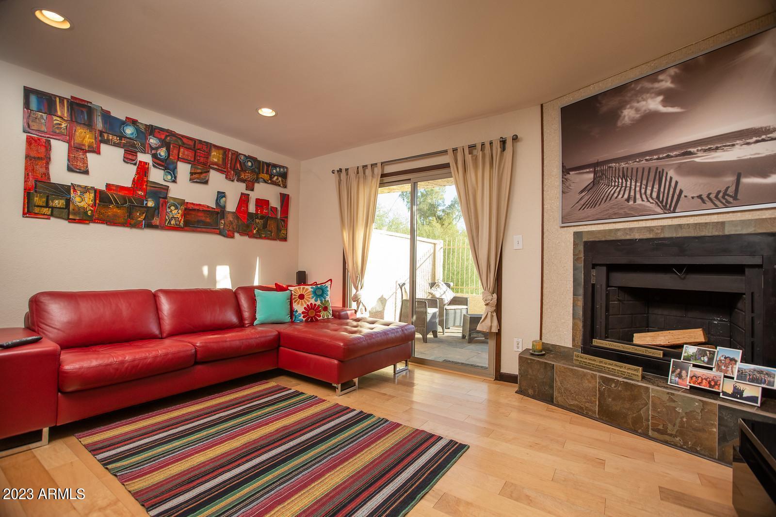 7755 East Thomas Road, Unit 10 Scottsdale, AZ 85251 - Photo 2 of 28 Living Room & Fireplace