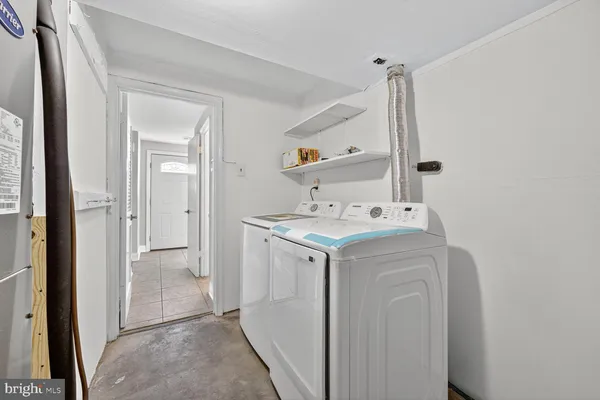 a bathroom with a sink vanity and a mirror