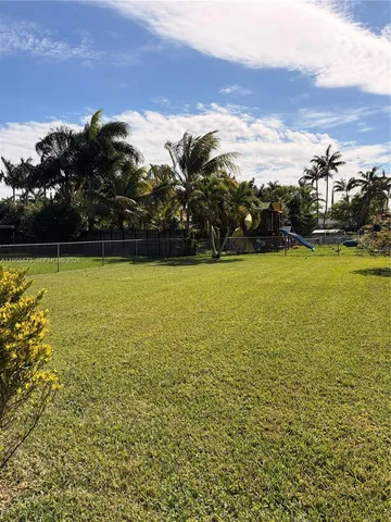 a view of an ocean and a mountain