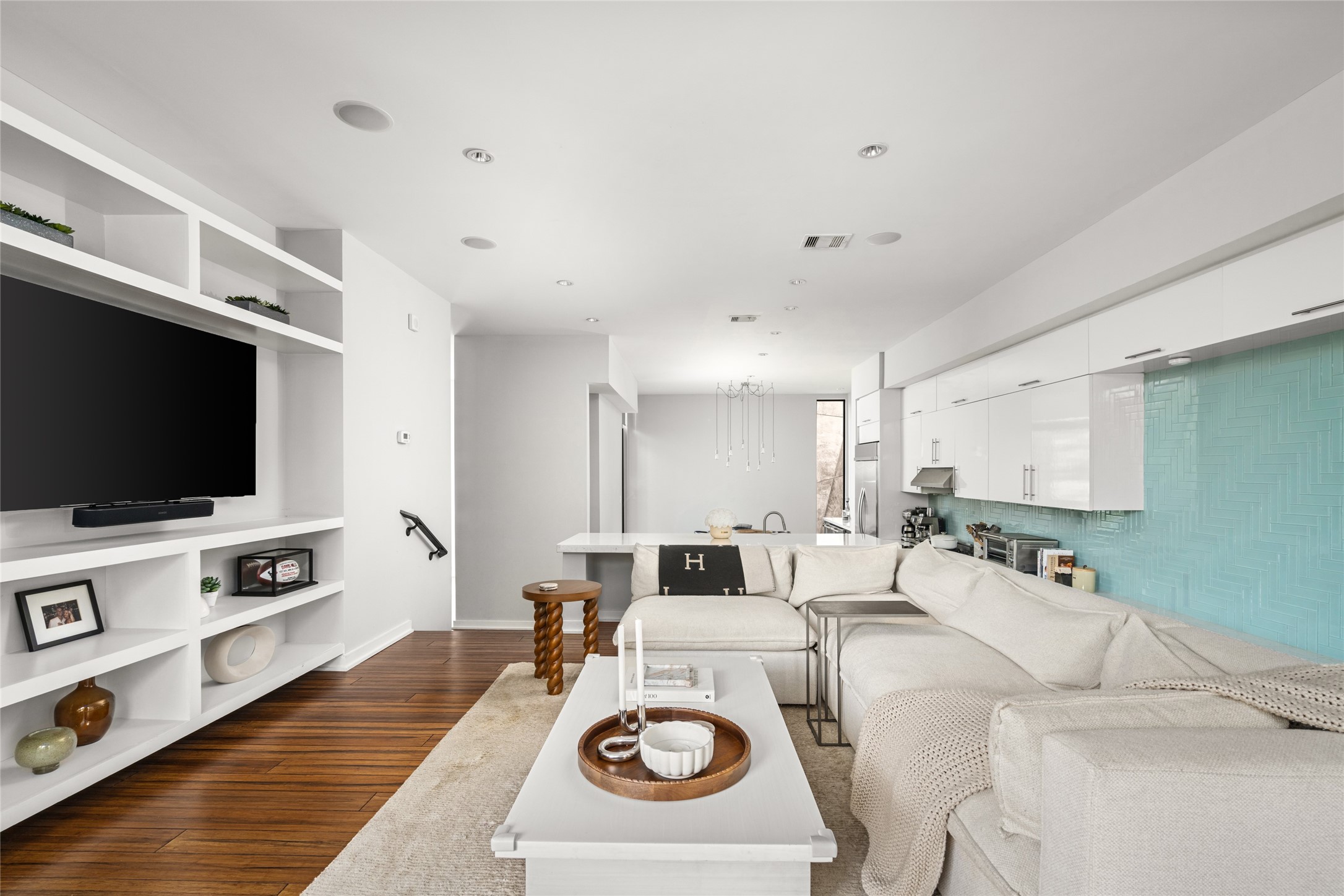 2202 Whitney Street Houston, TX 77006 - Photo 13 of 40 a living room with furniture and a flat screen tv