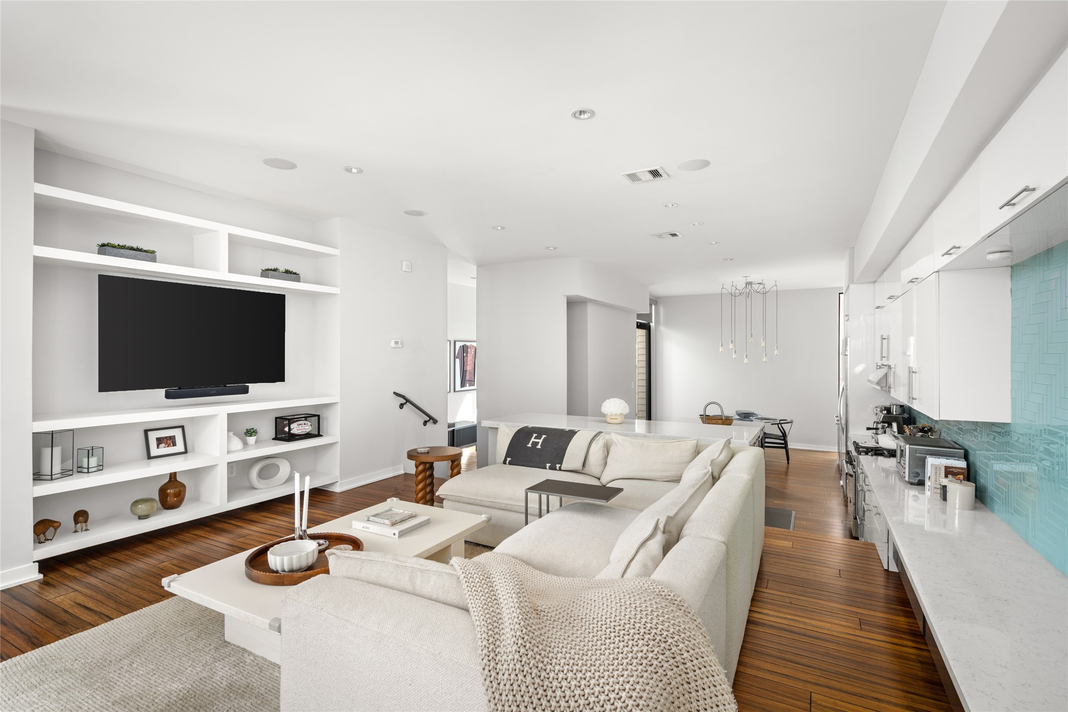 2202 Whitney Street Houston, TX 77006 - Photo 14 of 40 a living room with furniture and a flat screen tv
