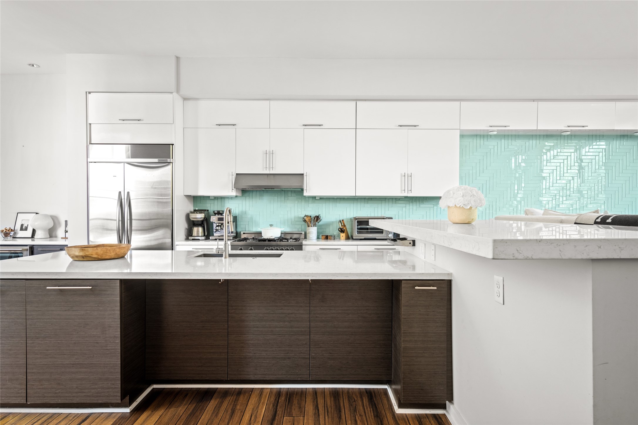 2202 Whitney Street Houston, TX 77006 - Photo 17 of 40 a kitchen with stainless steel appliances granite countertop a stove a sink and white cabinets