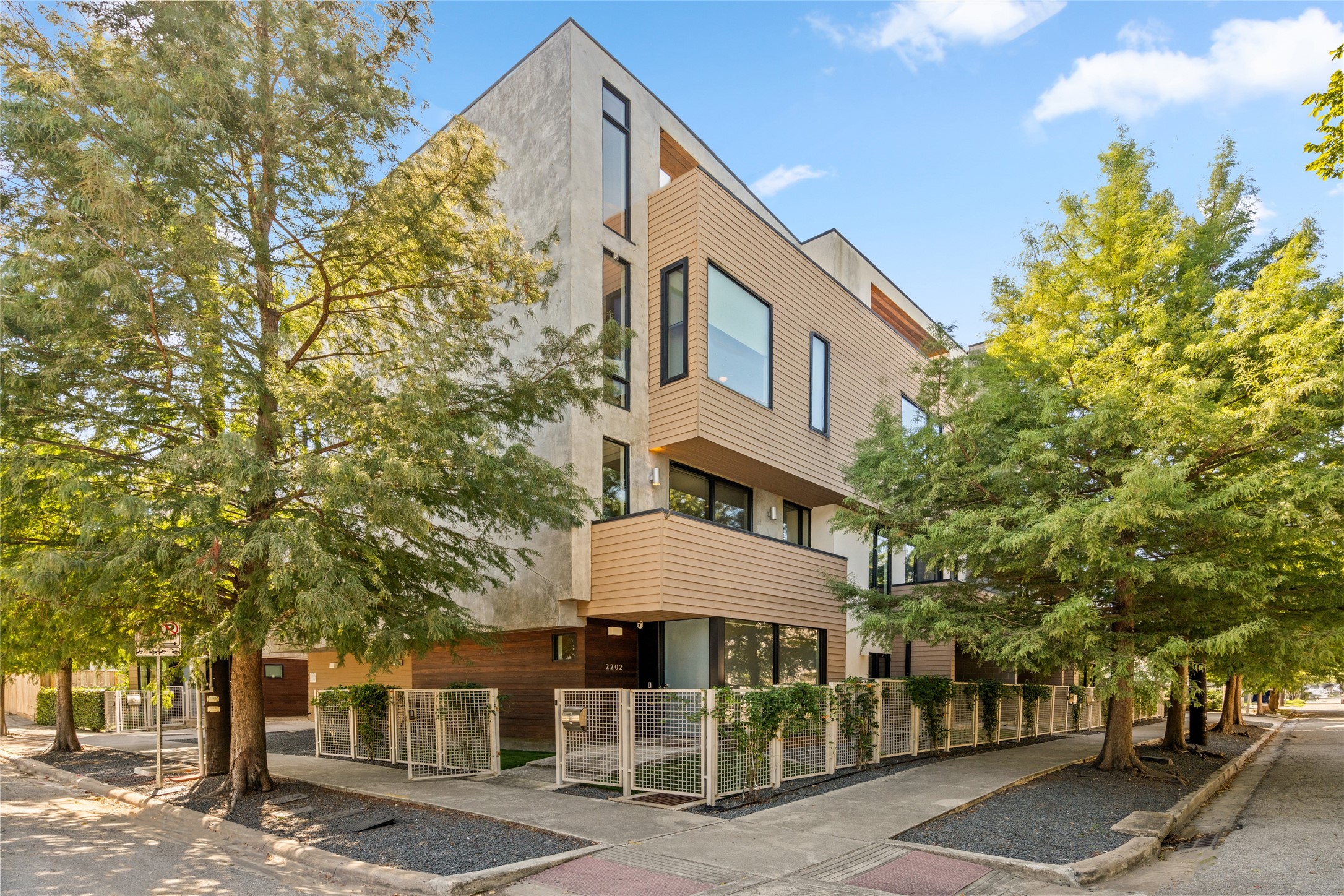 2202 Whitney Street Houston, TX 77006 - Photo 2 of 40 a front view of a building with trees