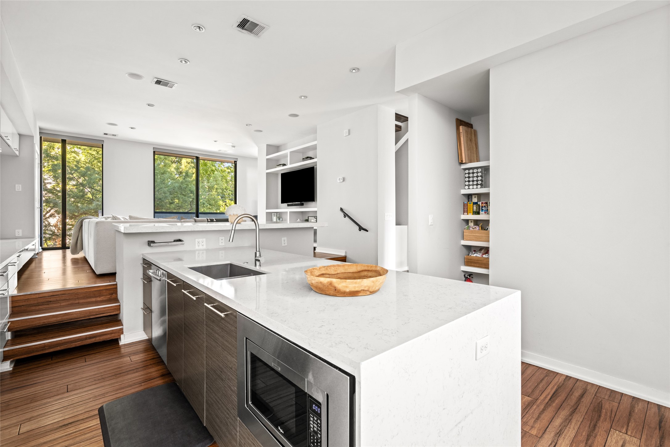 2202 Whitney Street Houston, TX 77006 - Photo 23 of 40 a view of kitchen with sink microwave and stove
