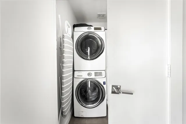 a utility room with dryer and washer