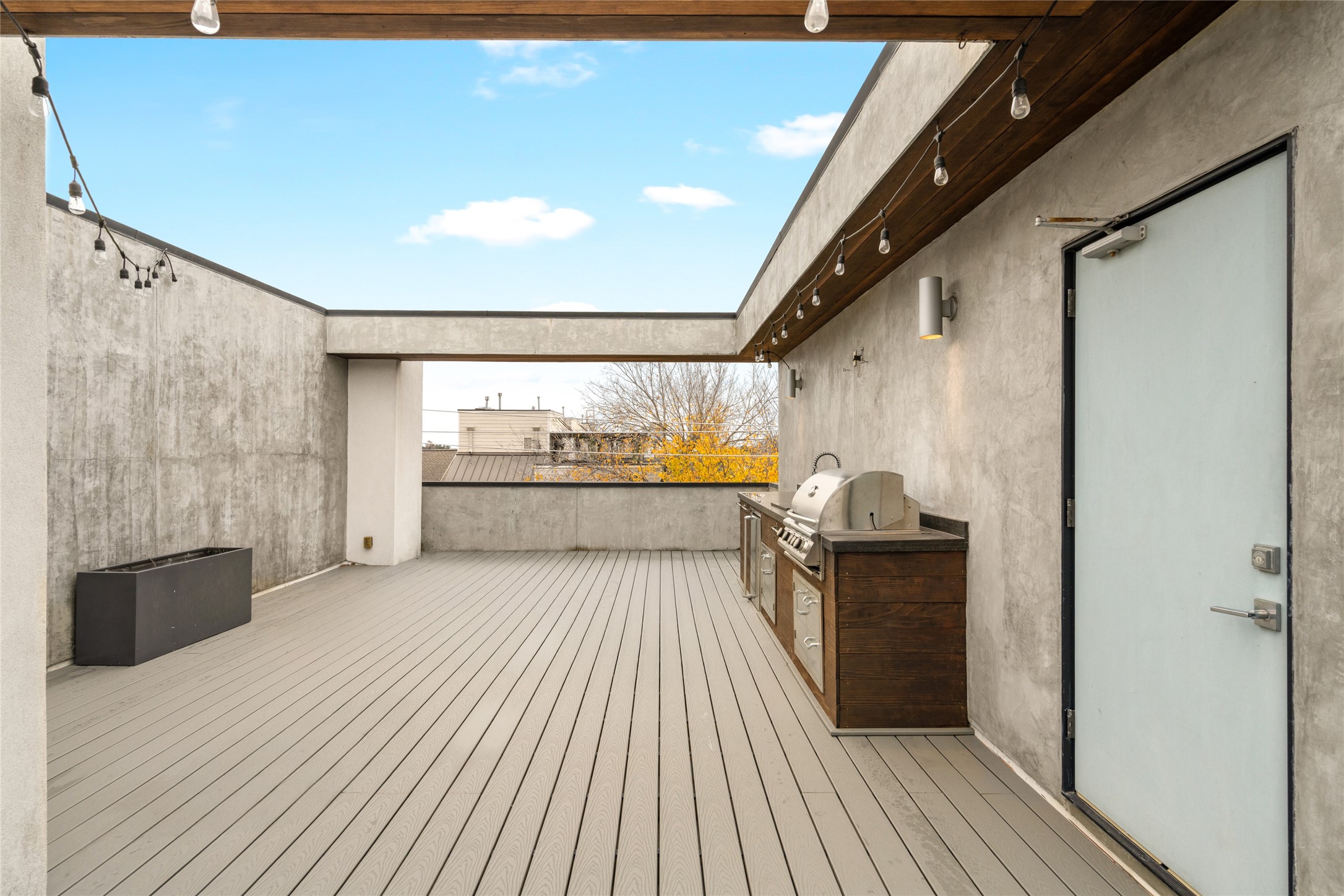 2202 Whitney Street Houston, TX 77006 - Photo 36 of 40 a open kitchen with a sink and refrigerator