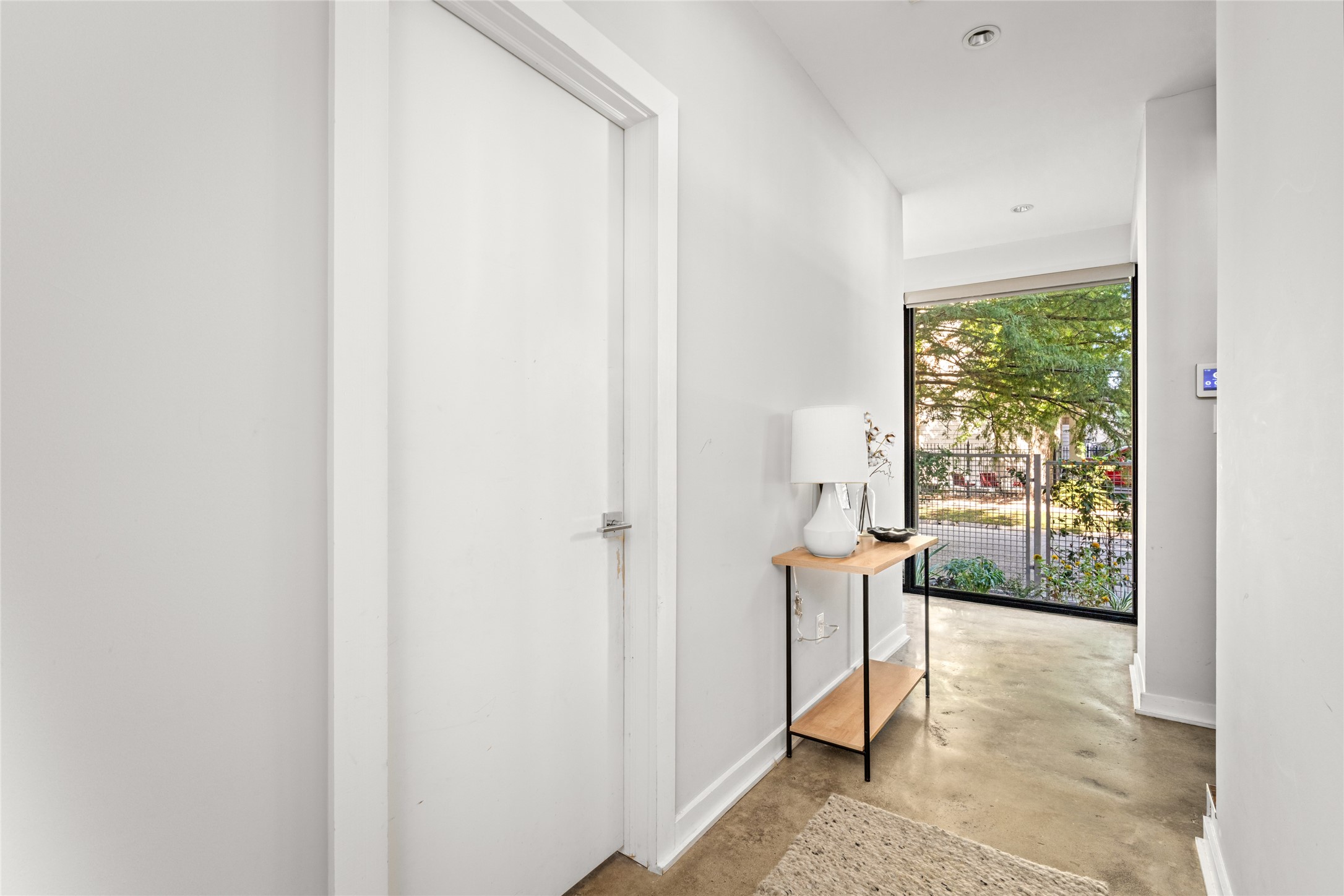 2202 Whitney Street Houston, TX 77006 - Photo 6 of 40 a view of hallway with furniture and a window