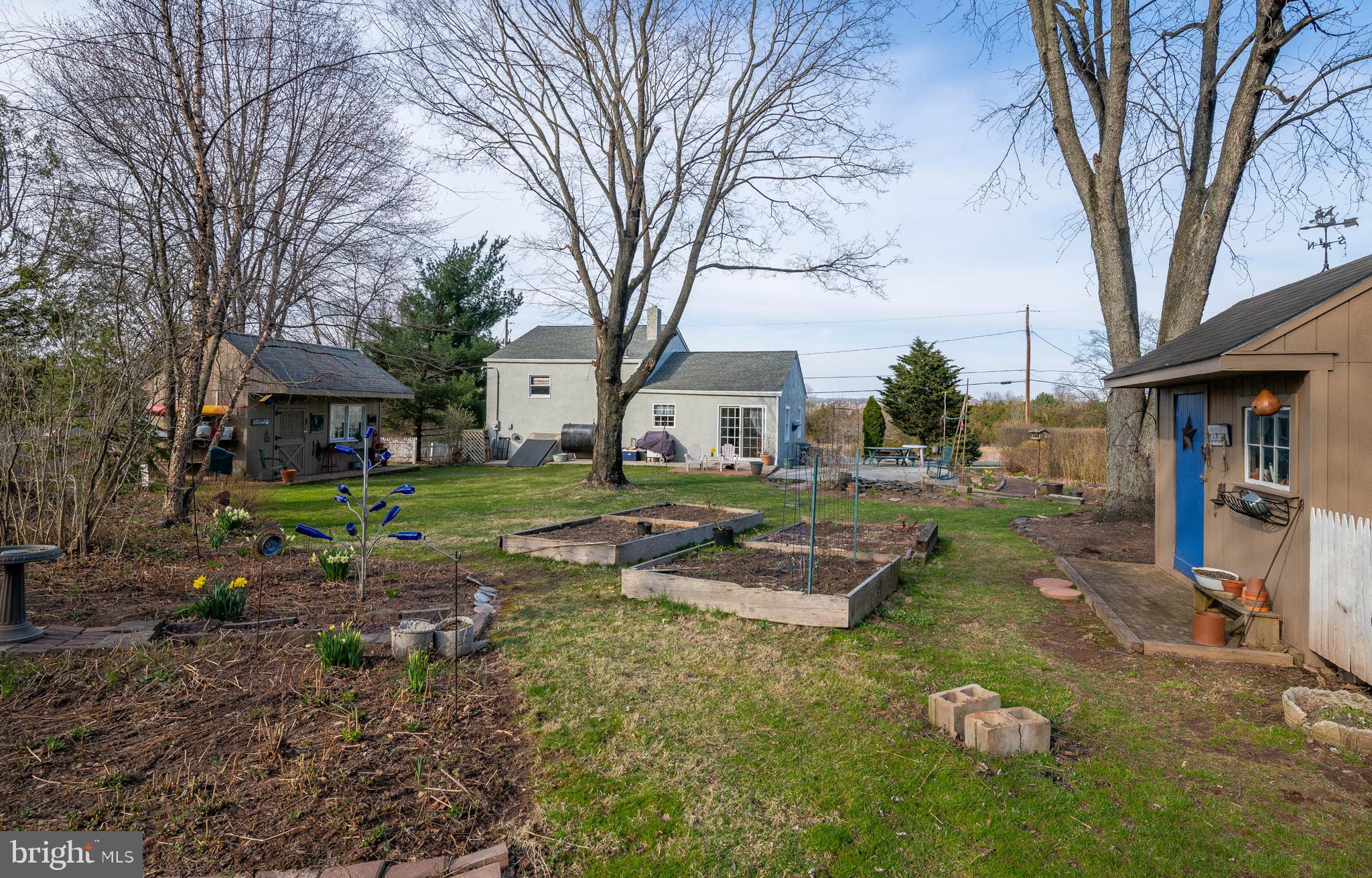 1305 Klinerd Road Pennsburg, PA 18073 - Photo 20 of 29 Back yard with raised beds