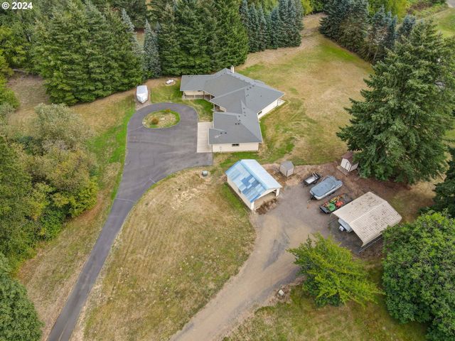 $890,000 | 2835 Old Lewis River Road, Woodland, WA 98674