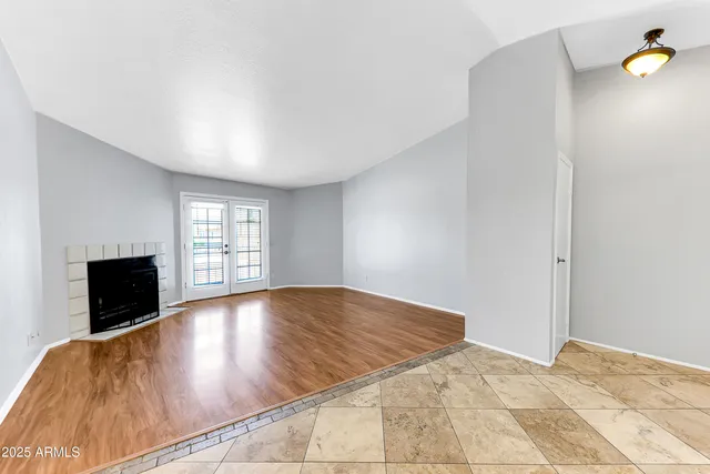 an empty room with windows