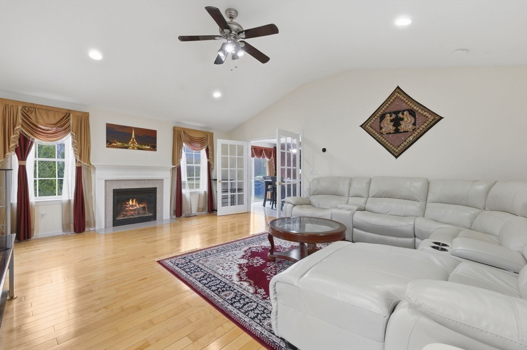 16 Windsor Road Shirley, MA 01464 - Photo 5 of 29 a living room with furniture and a fireplace
