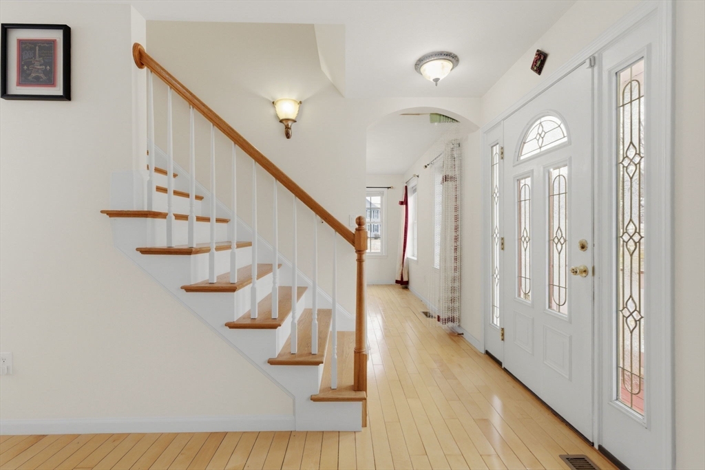 16 Windsor Road Shirley, MA 01464 - Photo 10 of 29 a view of entryway and hall with wooden floor