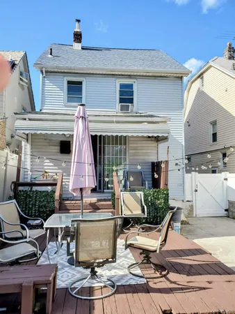a view of house with a patio