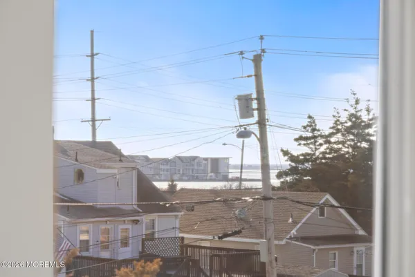 a picture of a house with a street