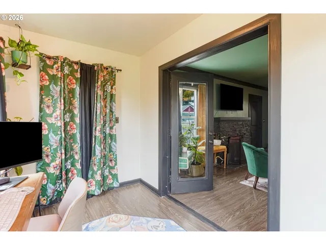 a view of a living room and a window