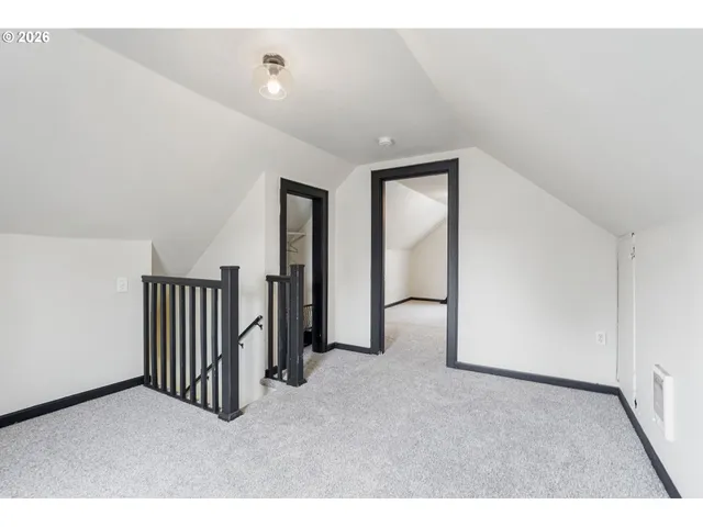 a view of a livingroom with staircase